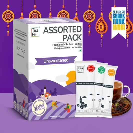 Tea Fit Assorted Pack Premium Milk Tea Premix Unsweetened, shown with its retail box and three individual sachets alongside a cup of milk tea on a purple decorative background.