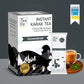 Tea Fit Instant Karak Tea Premium Milk Tea Premix in a white and black box, shown alongside a single sachet, a glass of milk tea, and green tea leaves on a gray background with a Shark Tank India badge.
