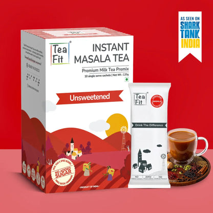 Tea Fit Instant Masala Tea Premix box and single serve sachet shown on a red studio background, with a cup of prepared tea and a Shark Tank India badge.