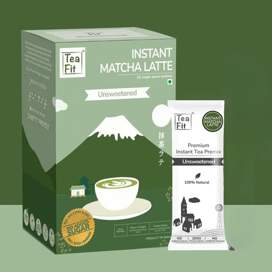 Tea Fit Instant Matcha Latte unsweetened product box with a single sachet packet beside it on a green background