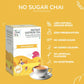 Tea Fit Instant Saffron Tea product box under 'NO SUGAR CHAI' heading, with icon list highlighting 100% natural ground spices, zero preservatives, no added sugar, no added colours, no artificial flavours, and no sweeteners, on a yellow background