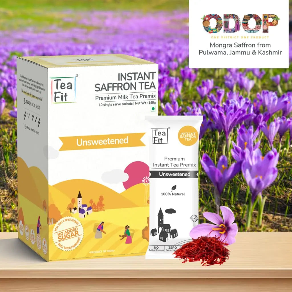 Tea Fit Instant Saffron Tea product box and sachet packet in a saffron flower field, featuring the ODOP One District One Product certification label for authentic Mongra saffron sourced from Pulwama, Jammu and Kashmir