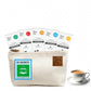 TeaFit travel pouch with 30 assorted instant chai tea sachets and a cup of prepared tea on a white background